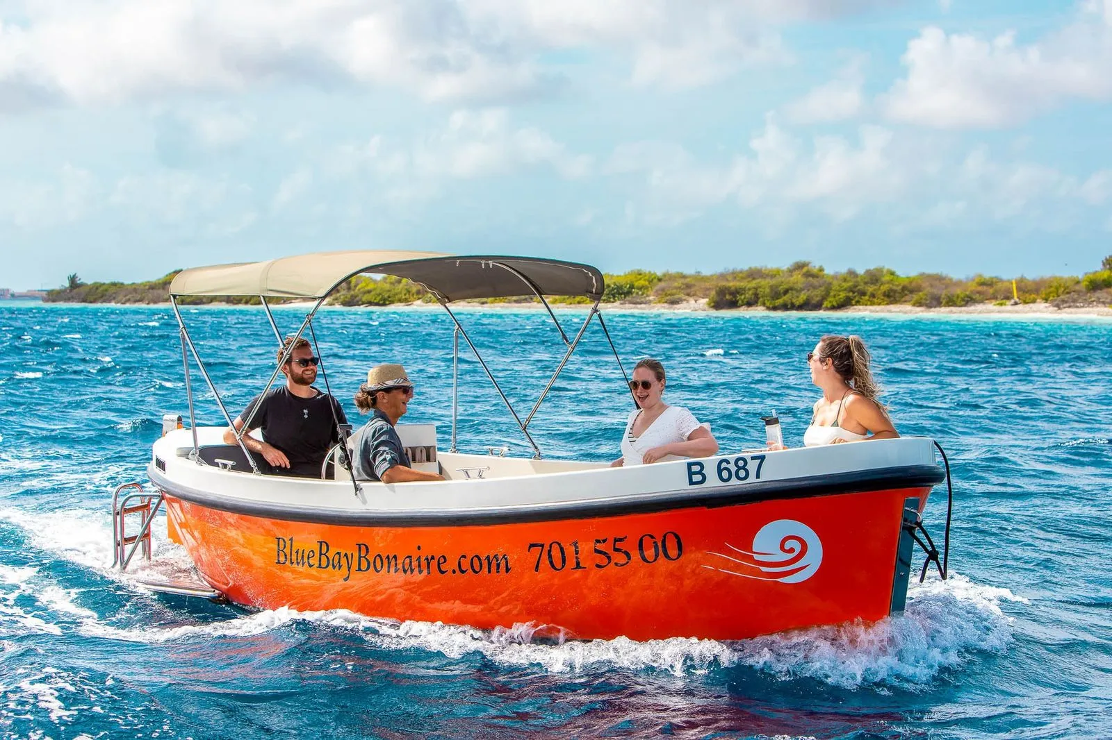 Orange Dutch Sloop on the water of Bonaire, photo 3 of 9