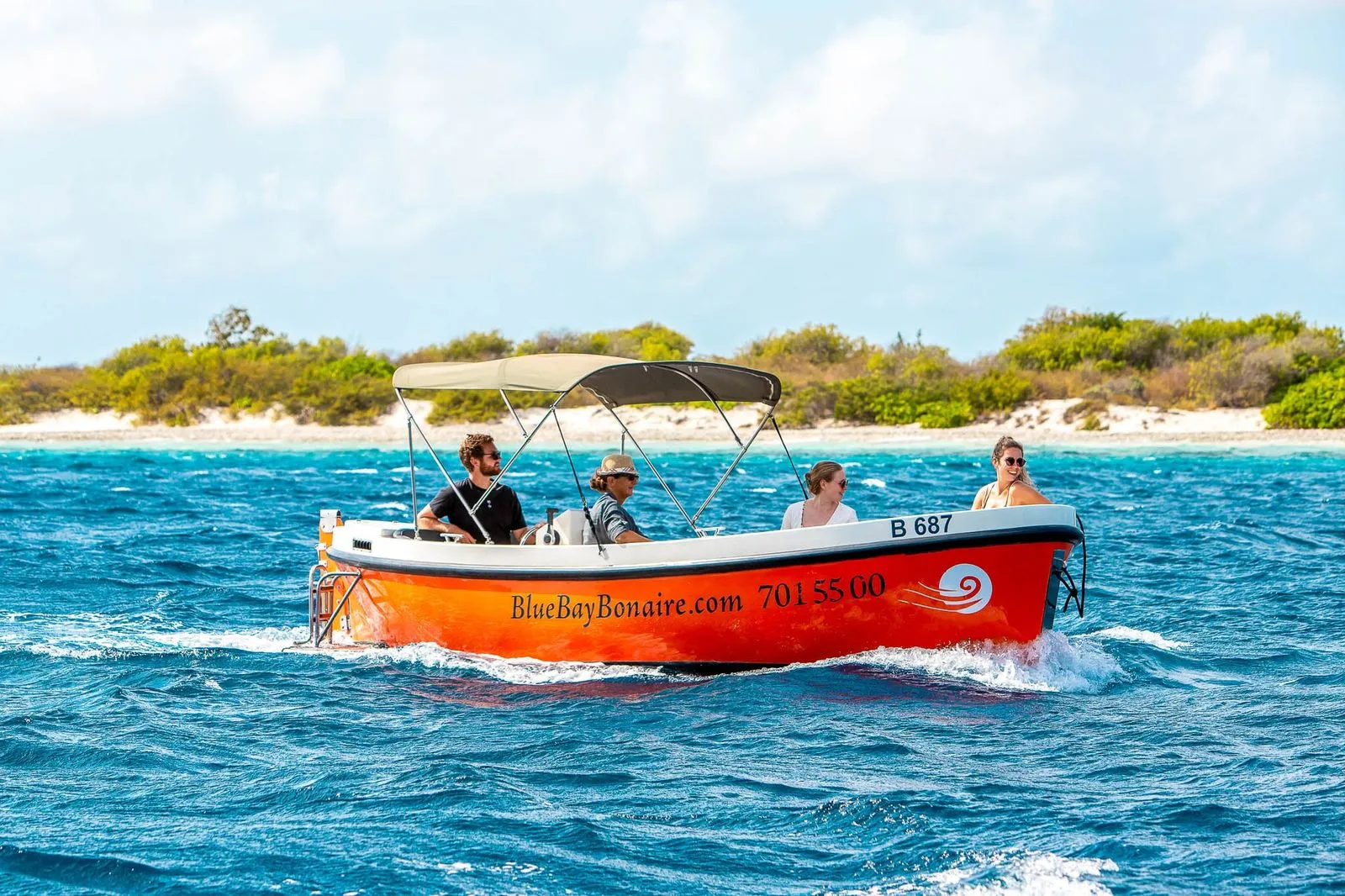 Orange Dutch Sloop on the water of Bonaire, photo 6 of 9