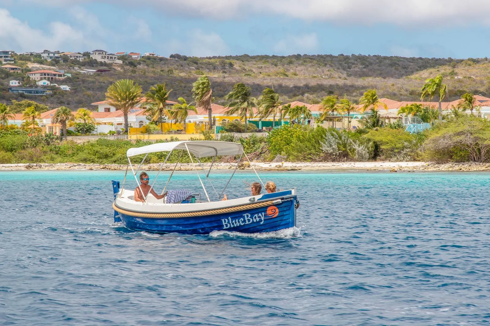 Blue Dutch Sloop on the water of Bonaire, photo 7 of 11