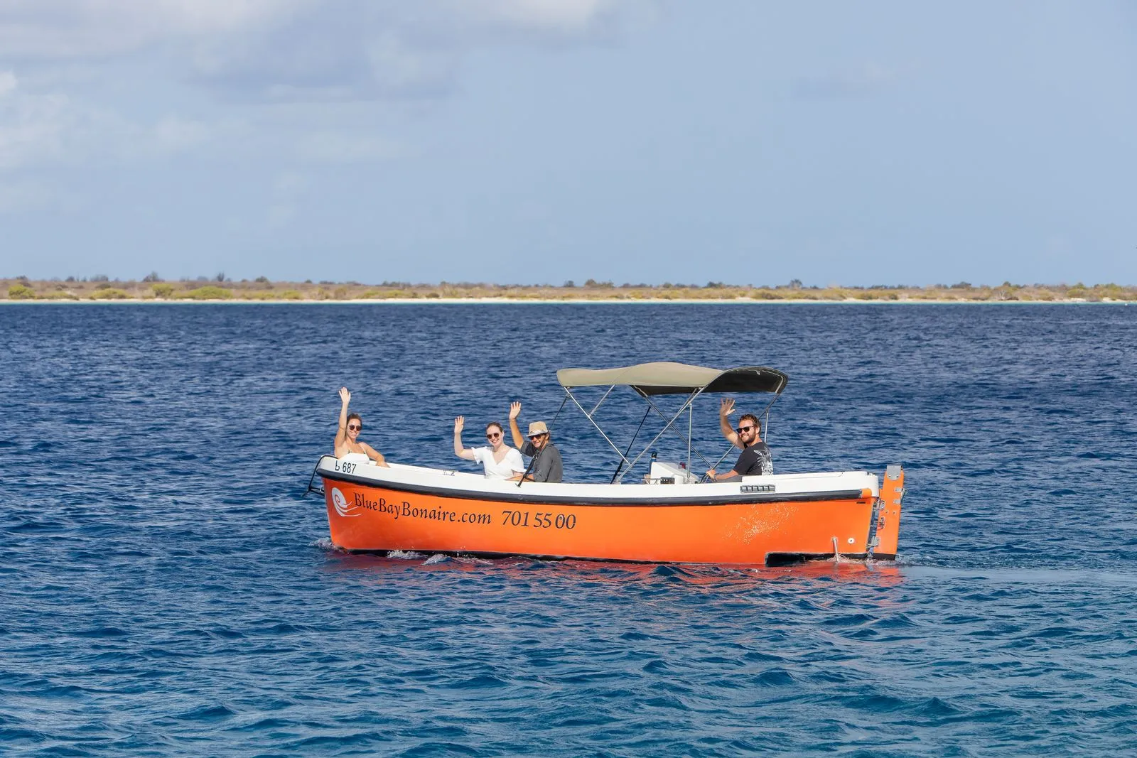 Orange Dutch Sloop on the water of Bonaire, photo 7 of 9