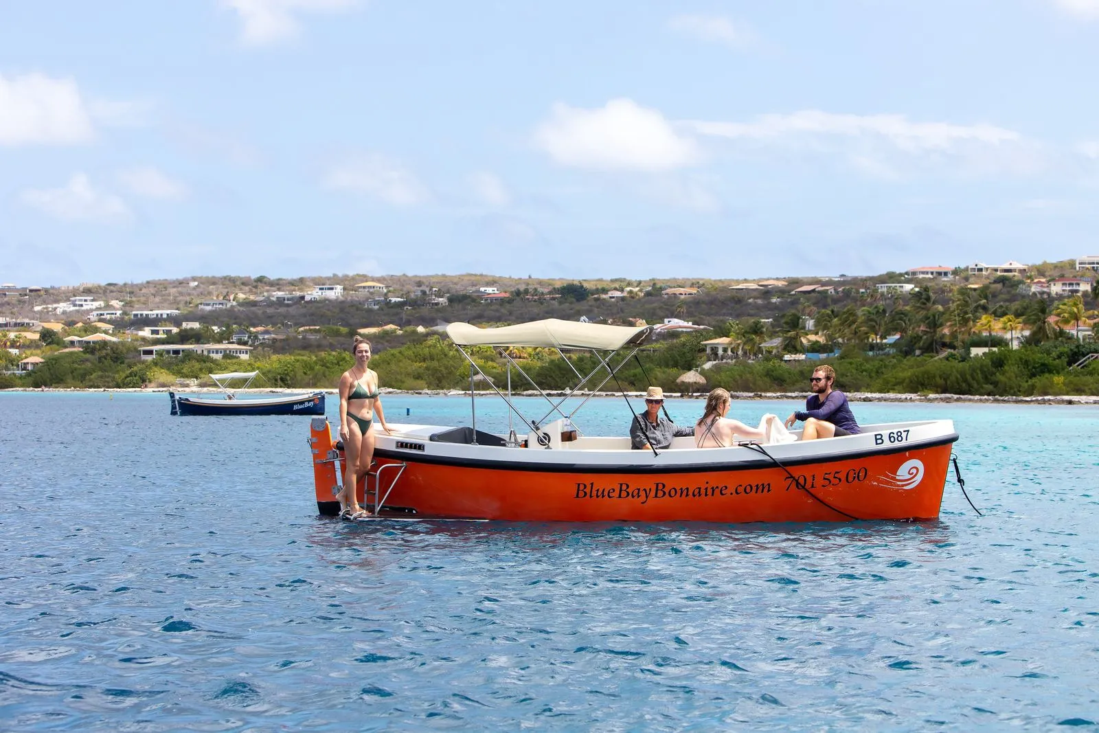Orange Dutch Sloop on the water of Bonaire, photo 8 of 9