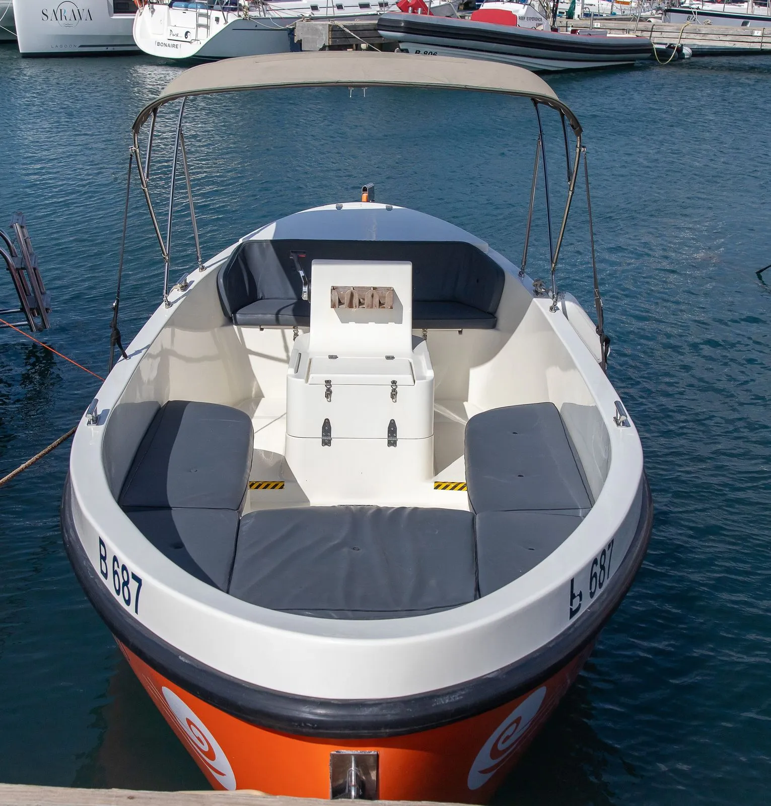 Orange Dutch Sloop on the water of Bonaire, photo 9 of 9